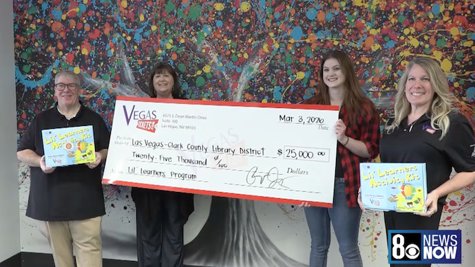 Donation to Enterprise Library Helps Child Literacy